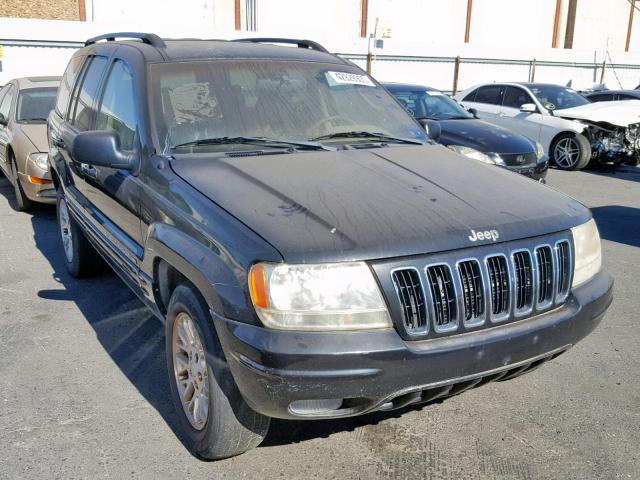 1J8GW58N13C567873 - 2003 JEEP GRAND CHER BLACK photo 1