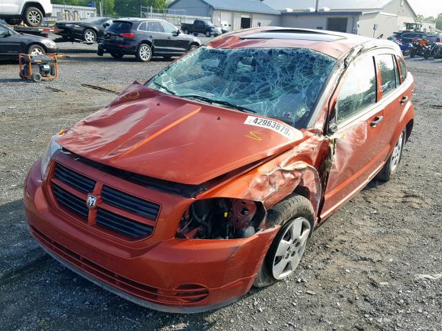 1B3HB28A59D169329 - 2009 DODGE CALIBER SE ORANGE photo 2