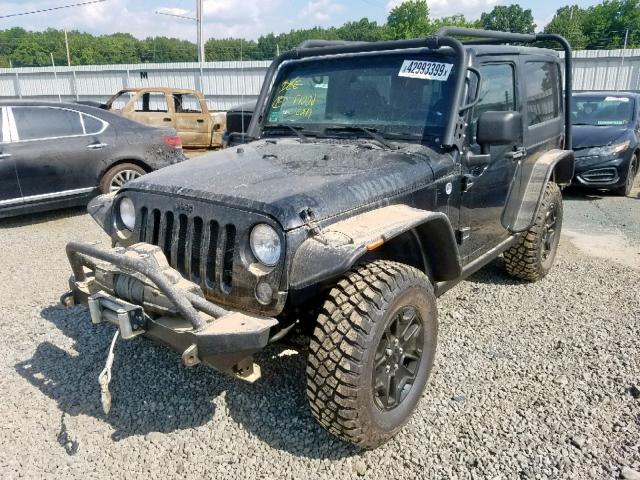 1C4AJWAG2EL219161 - 2014 JEEP WRANGLER S BLACK photo 2