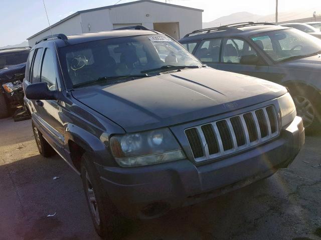 1J4GW48S44C202333 - 2004 JEEP GRAND CHER BLACK photo 1