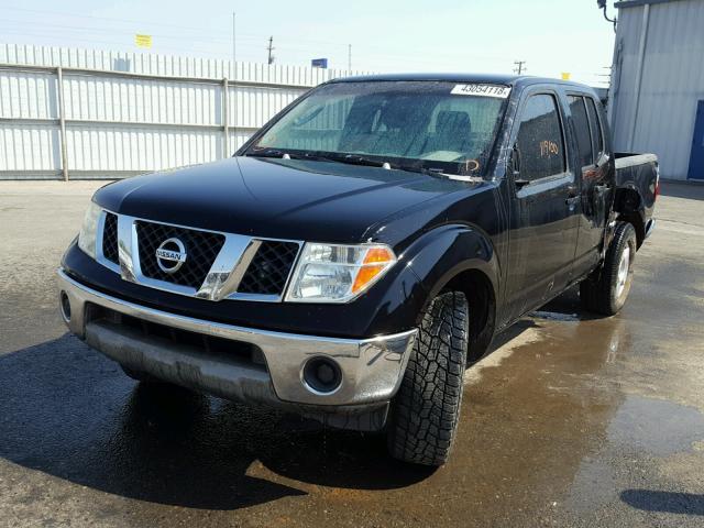 1N6AD07U36C473929 - 2006 NISSAN FRONTIER C BLACK photo 2