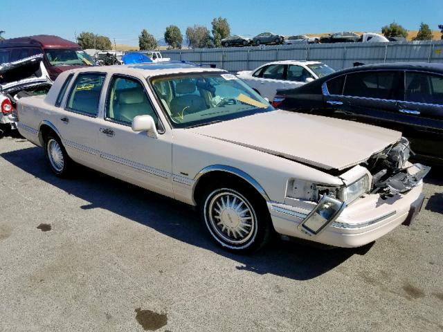 1LNLM83W9VY752851 - 1997 LINCOLN TOWN CAR C BEIGE photo 1