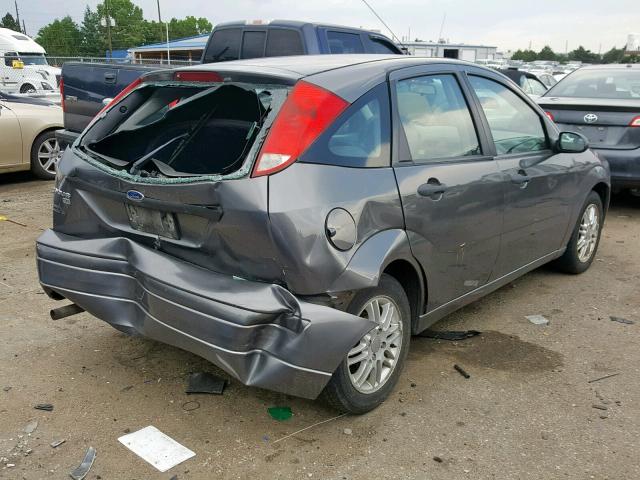 1FAFP37N57W180534 - 2007 FORD FOCUS ZX5 GRAY photo 4