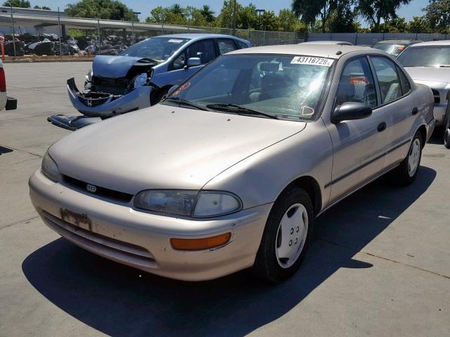 1Y1SK5269SZ063920 - 1995 GEO PRIZM BASE ოქროსფერი ფოტო 2