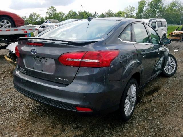 1FADP3J28FL226945 - 2015 FORD FOCUS TITA GRAY photo 4