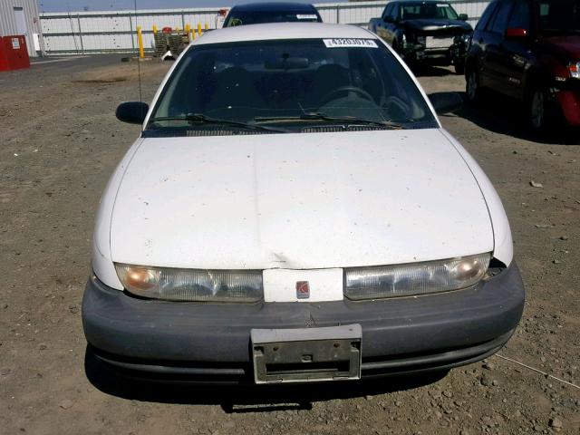 1G8ZH5280XZ264352 - 1999 SATURN SL1 WHITE photo 9