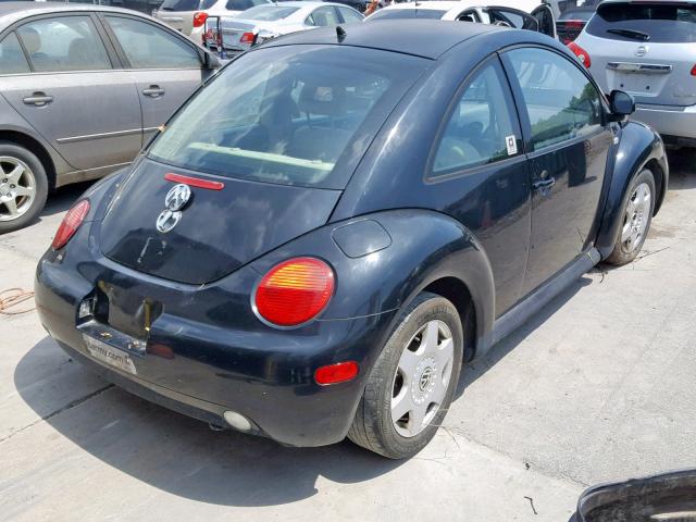 3VWCA21C5XM404401 - 1999 VOLKSWAGEN NEW BEETLE BLACK photo 4