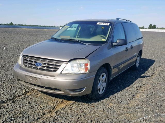 2FMZA51694BB27723 - 2004 FORD FREESTAR S GOLD photo 2