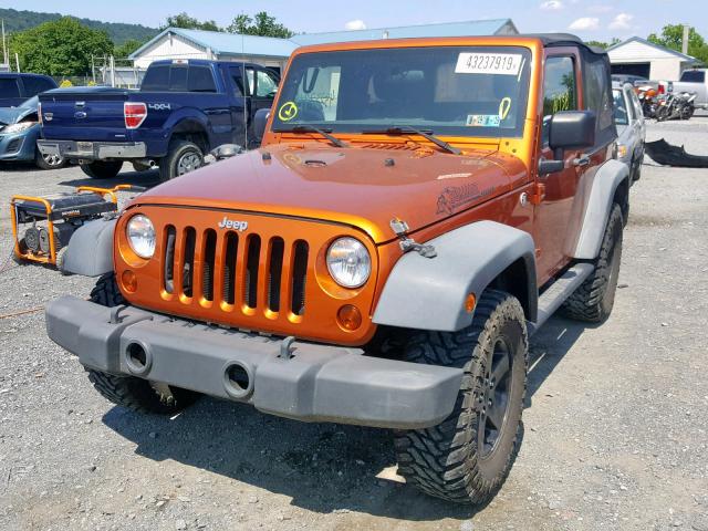 1J4AA2D11BL581892 - 2011 JEEP WRANGLER S ORANGE photo 2