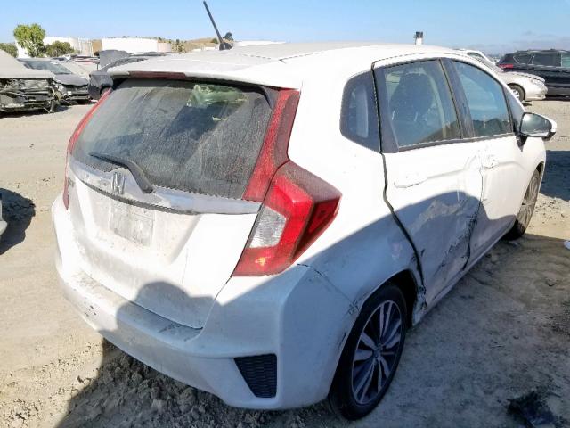 JHMGK5H70GS009365 - 2016 HONDA FIT EX WHITE photo 4