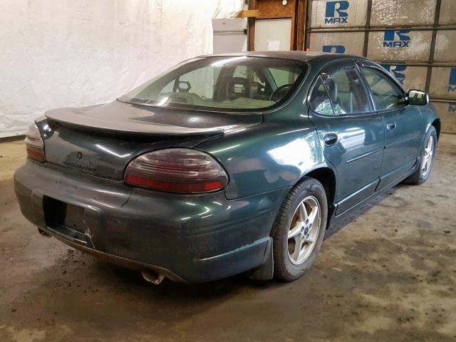 1G2WP52K6XF275157 - 1999 PONTIAC GRAND PRIX GREEN photo 4