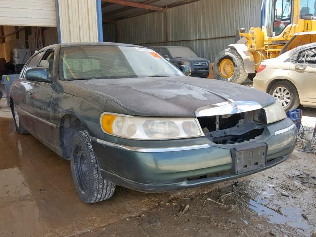 1LNHM81WXXY707476 - 1999 LINCOLN TOWN CAR E GREEN photo 1