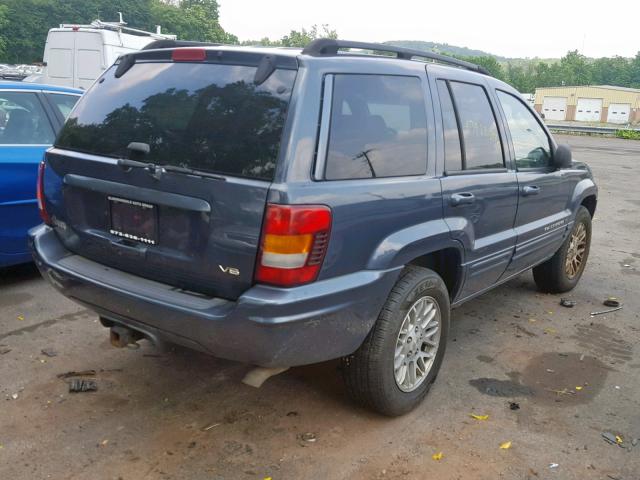 1J4GW58N42C205858 - 2002 JEEP GRAND CHER BLUE photo 4