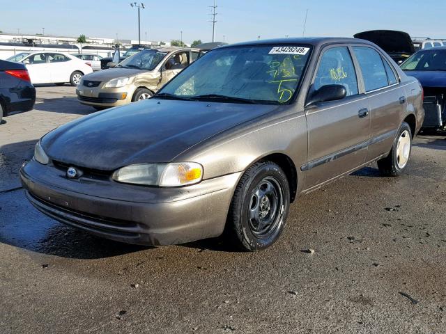 1Y1SK5280YZ420993 - 2000 CHEVROLET GEO PRIZM Qəhvəyi foto 2