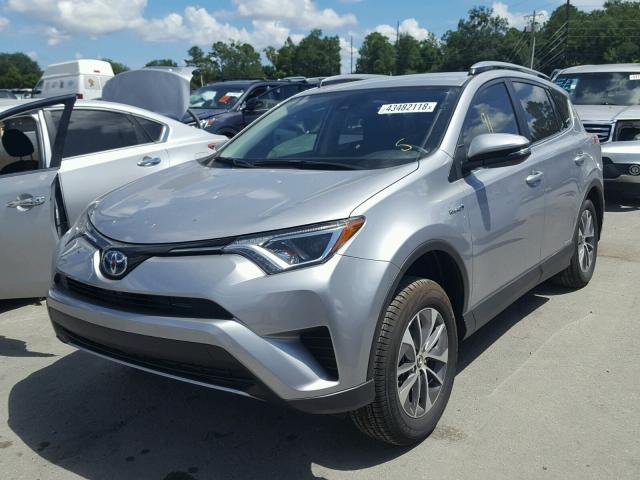 JTMRJREV2JD180931 - 2018 TOYOTA RAV4 HV LE SILVER photo 2