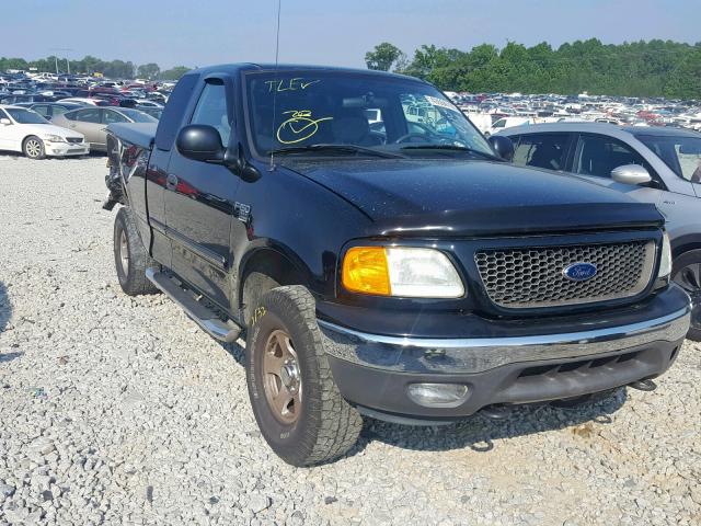 2FTRX18W34CA25572 - 2004 FORD F-150 HERI BLACK photo 1