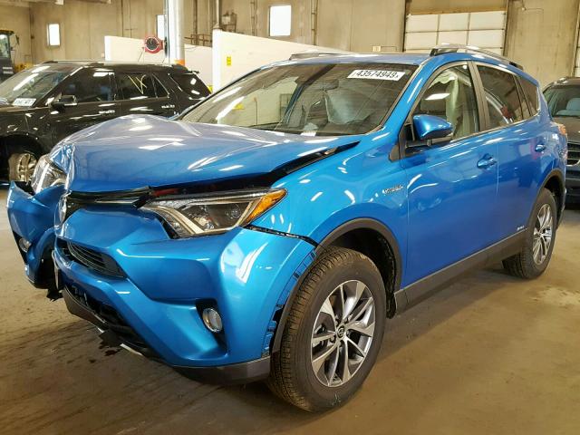 JTMRJREV0JD188381 - 2018 TOYOTA RAV4 HV LE BLUE photo 2