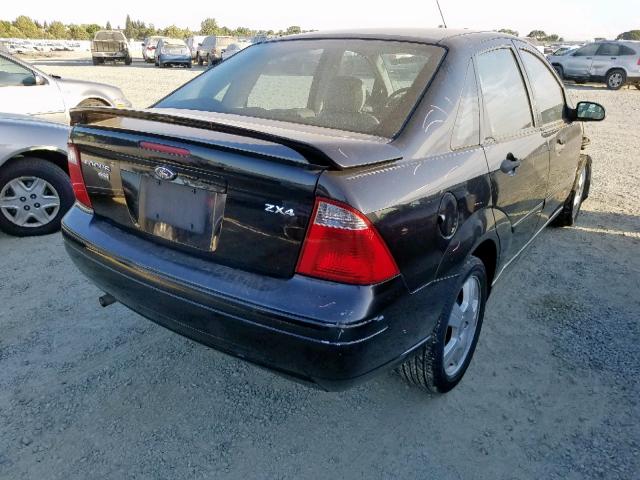 1FAHP34N56W205024 - 2006 FORD FOCUS ZX4 BLACK photo 4