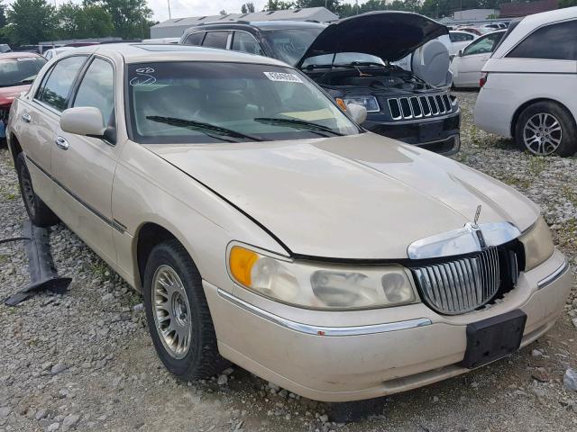 1LNHM83W5XY690907 - 1999 LINCOLN TOWN CAR C WHITE photo 1