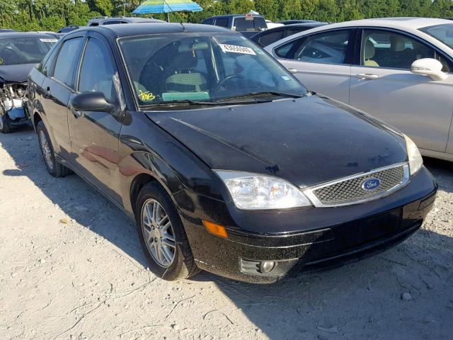 1FAHP34N27W262167 - 2007 FORD FOCUS ZX4 BLACK photo 1