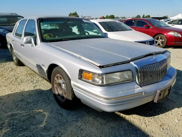 1LNLM83W1VY738510 - 1997 LINCOLN TOWN CAR C SILVER photo 1