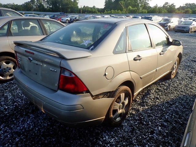 1FAHP34NX6W171873 - 2006 FORD FOCUS ZX4 GOLD photo 4