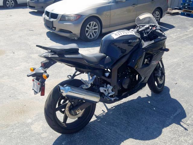 KM4MJ6274H1701171 - 2017 HYOSUNG MOTORCYCLE BLACK photo 4
