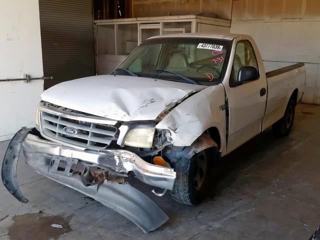 2FTRF17274CA76963 - 2004 FORD F-150 HERI WHITE photo 2