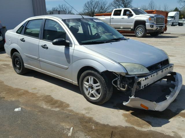 1FAFP34NX5W290142 - 2005 FORD FOCUS ZX4 SILVER photo 1