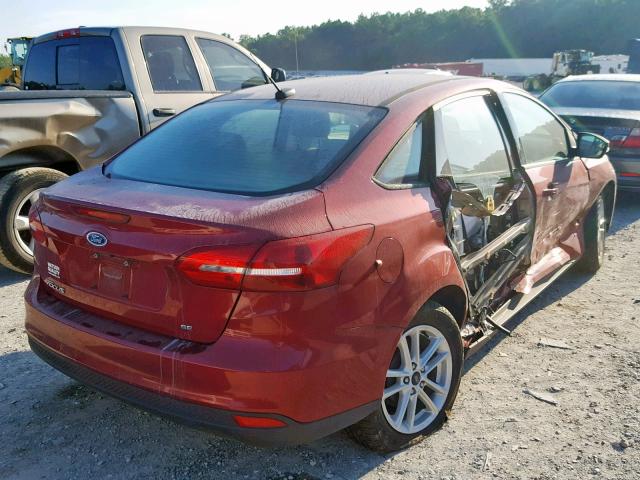 1FADP3F26HL294270 - 2017 FORD FOCUS SE RED photo 4