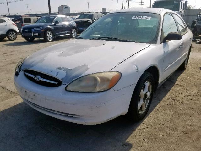 1FAFP52U9YG127065 - 2000 FORD TAURUS LX WHITE photo 2