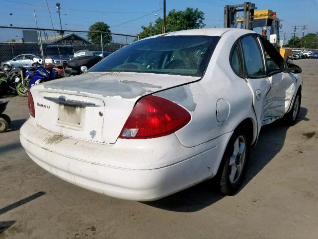 1FAFP52U9YG127065 - 2000 FORD TAURUS LX WHITE photo 4