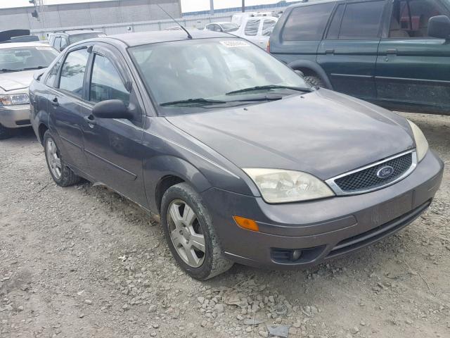 1FAFP34N06W124374 - 2006 FORD FOCUS ZX4 GRAY photo 1