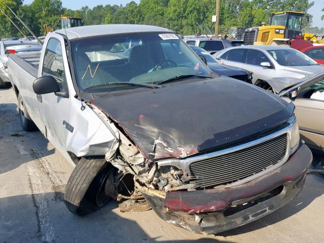 2FTRF17284CA88135 - 2004 FORD F-150 HERI SILVER photo 1