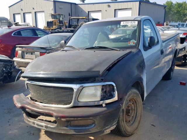 2FTRF17284CA88135 - 2004 FORD F-150 HERI SILVER photo 2