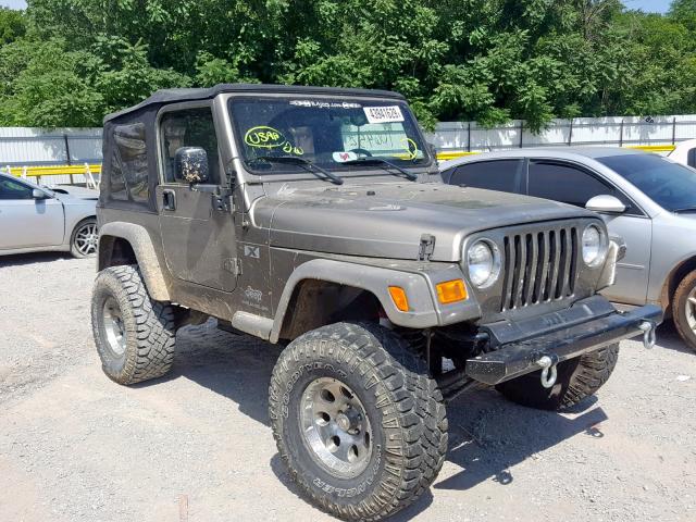 1J4FA39S55P386145 - 2005 JEEP WRANGLER X TAN photo 1