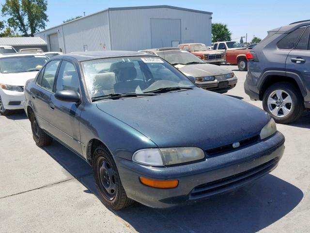 1Y1SK5261VZ411391 - 1997 GEO PRIZM BASE მწვანე ფოტო 1