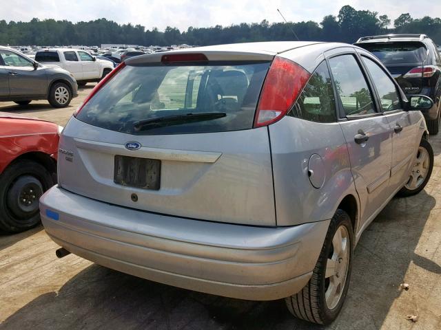 1FAHP37N27W347974 - 2007 FORD FOCUS ZX5 SILVER photo 4