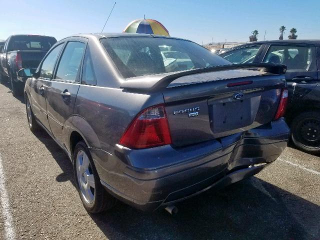 1FAHP34N07W107603 - 2007 FORD FOCUS ZX4 GRAY photo 3