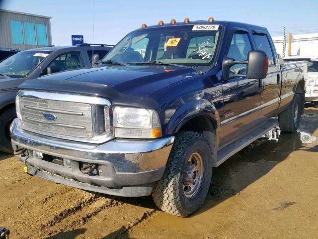 1FTSW31P84ED60453 - 2004 FORD F350 SRW S BLUE photo 2