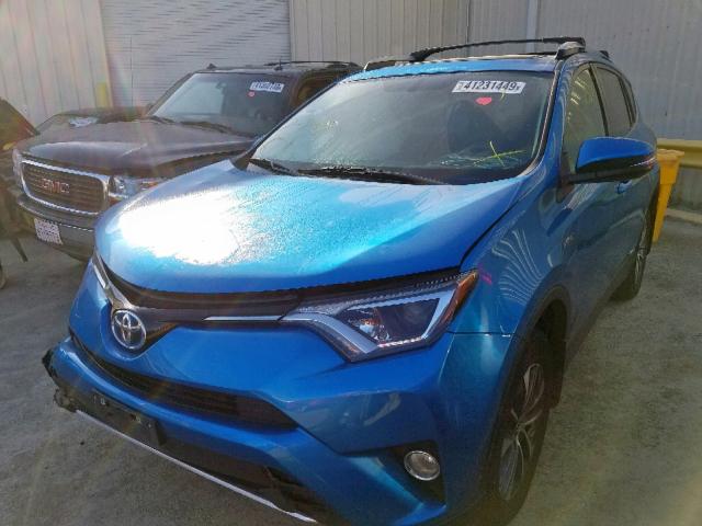 JTMRJREV1GD048381 - 2016 TOYOTA RAV4 HV XL BLUE photo 2