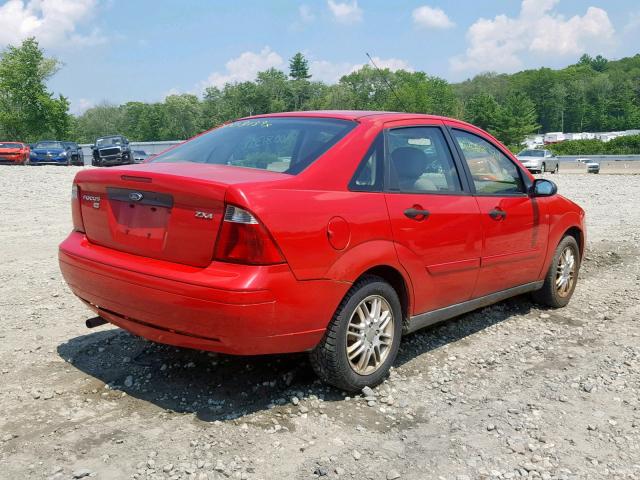 1FAFP34N95W266589 - 2005 FORD FOCUS ZX4 RED photo 4