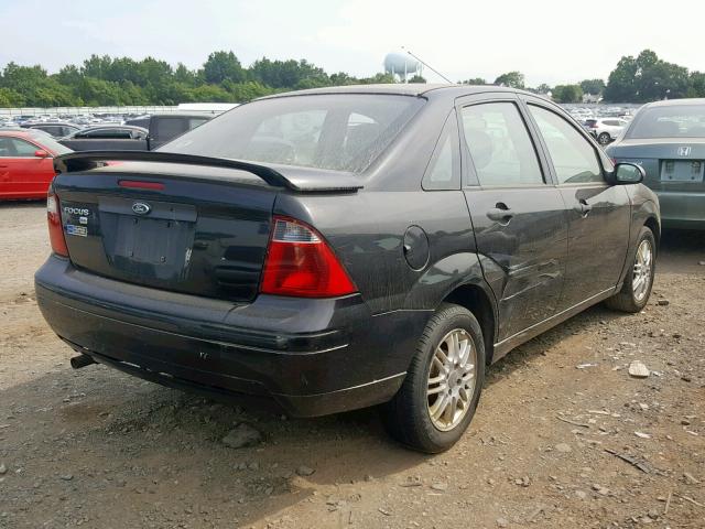 1FAFP34N07W156517 - 2007 FORD FOCUS ZX4 BLACK photo 4