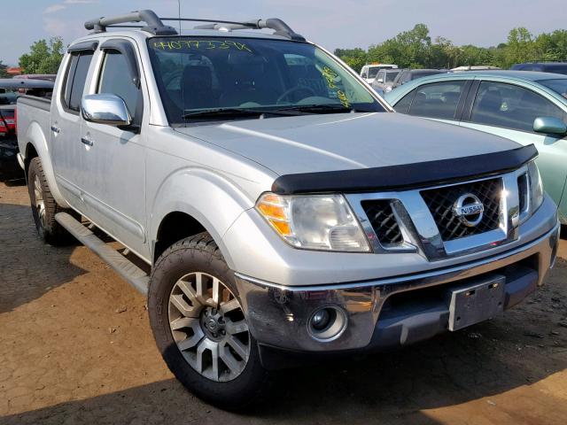 1N6AD0EV1AC404841 - 2010 NISSAN FRONTIER C SILVER photo 1