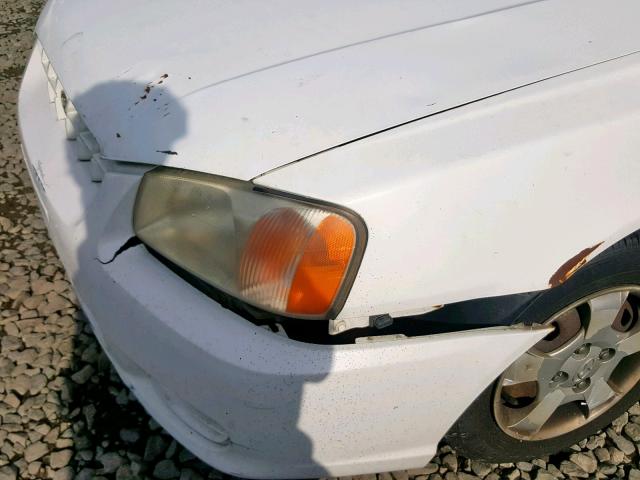 KMHCG45CX2U325569 - 2002 HYUNDAI ACCENT GL WHITE photo 9