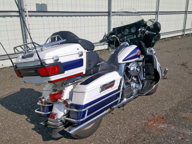 1HD1FC4157Y683105 - 2007 HARLEY-DAVIDSON FLHTCUI WHITE photo 4