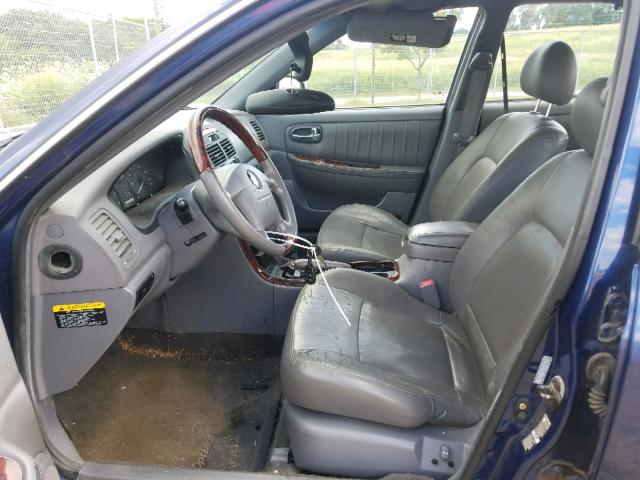 KNAGD128435221052 - 2003 KIA OPTIMA BLUE photo 5