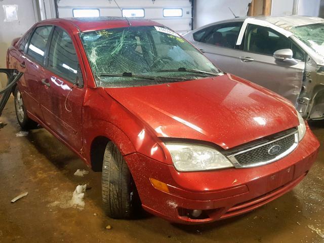 1FAFP34N05W221699 - 2005 FORD FOCUS ZX4 RED photo 1