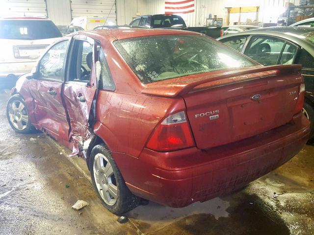 1FAFP34N05W221699 - 2005 FORD FOCUS ZX4 RED photo 3