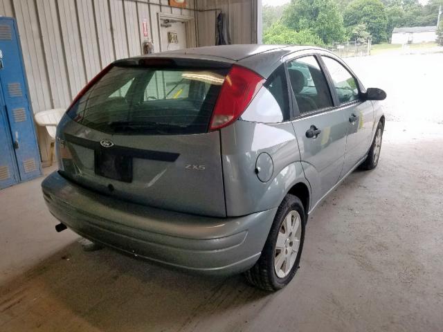 1FAFP37N56W164171 - 2006 FORD FOCUS ZX5 BLUE photo 4